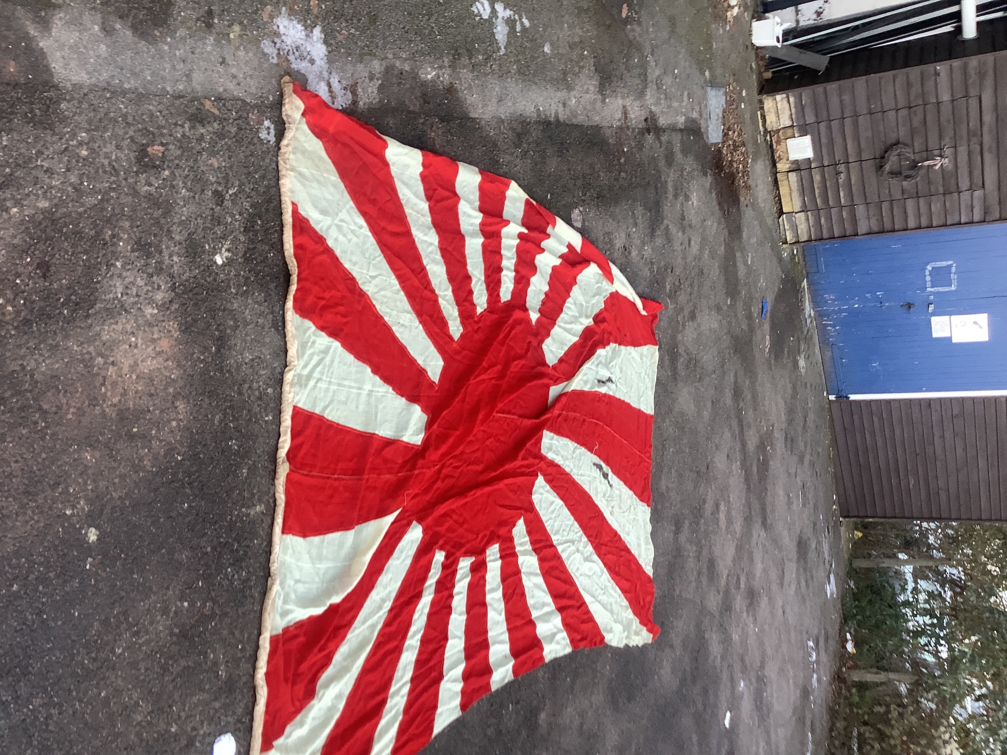 A large German Third Reich flag, 300 x 160cm, a Japan Rising Sun flag, 260cm, and other national flags